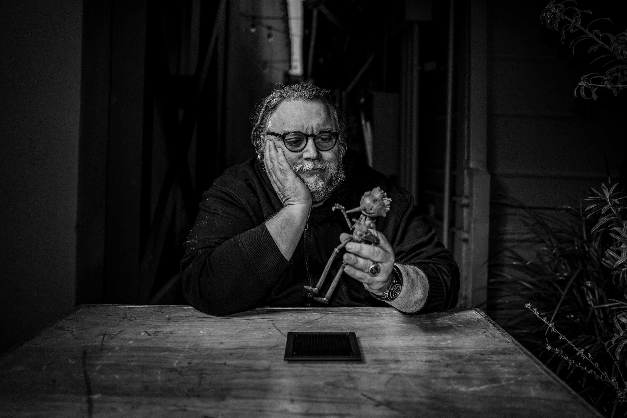 Del Toro with a Pinocchio doll